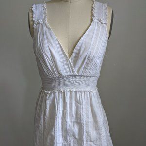 BCBG White sleeveless tunic blouse